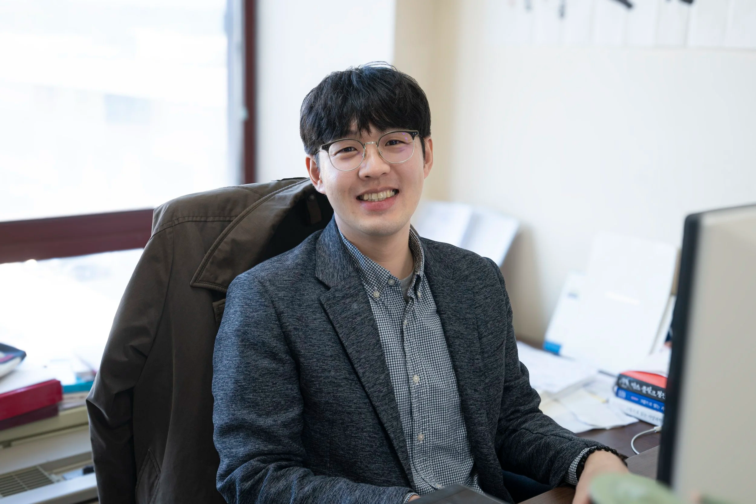 Jongsik Christian Yi speaking at an event